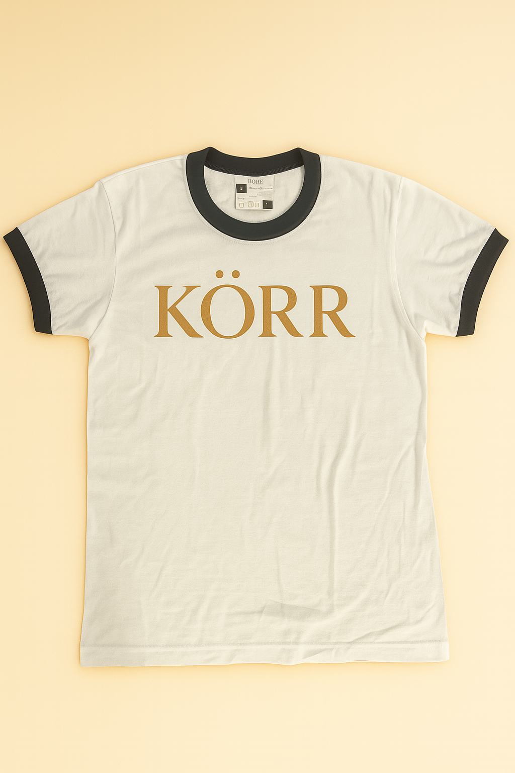 KÖRR Ringer Tee – White w/ Gold Logo (Black Trim)